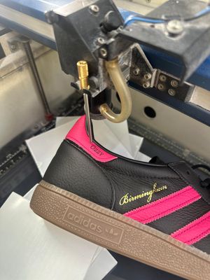 The engraved special edition Adidas trainers