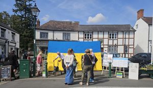 Signing the flag in Church Stretton