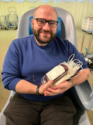 Alex Quant Smith with a blood donation