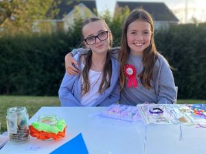 Supporting image for story: Young heroines spend birthday raising funds for charity
