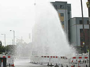 Supporting image for story: Water gushes from damaged mains