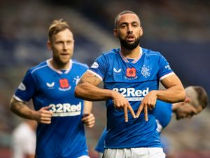 Supporting image for story: Footballer gives back to community with signed shirt