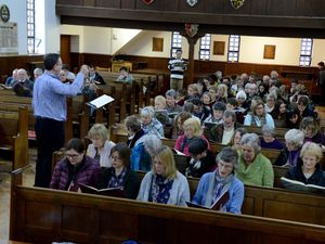 Supporting image for story: Top conductor leads school warm-up for classical concert - with video
