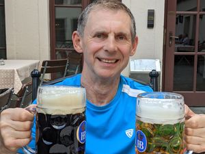 Ken halfway through his journey and pictured taking a five-day rest in Munich.