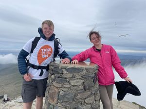 Supporting image for story: Sunburnt Shropshire couple celebrate completing charity mountain challenge 
