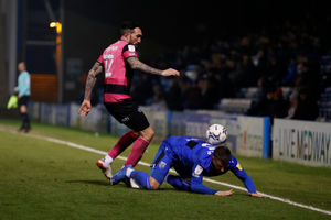 Ryan Bowman of Shrewsbury Town and Jack Tucker of Gillingham (AMA)