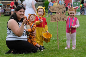 Ellis Sletcher as Tiger supported by his mum, Noah Howell as Winne the Pooh and Millie James as Piglet, all two at the carnival. Andy Compton image