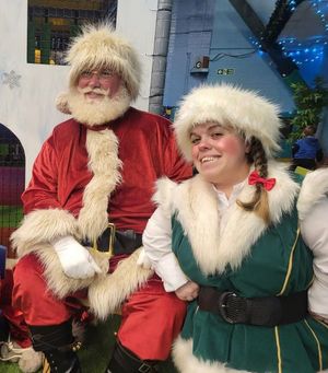 Santa and Chief Elf, who entertained children during the Christmas Party.