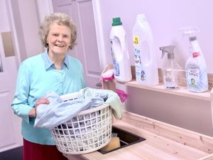 Dovedale Court Care Home’s resident Carmel Shaughnessy at dementia friendly community cleaning station