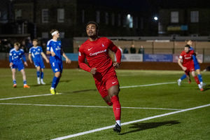 AFC Telford's Adan George wheels away in celebration having just scored his and his sides second goal Picture: Kieran Stoddart