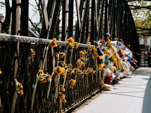 Supporting image for story: Bridge adorned with sunflowers in memory of Nathan Fleetwood