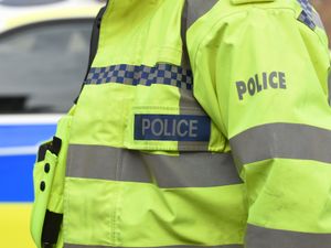 Supporting image for story: Six arrested after protest outside Manchester hotel