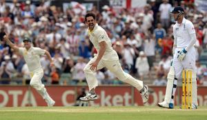 Australia's Mitchell Johnson celebrates taking the wicket of England's Tim Bresnan