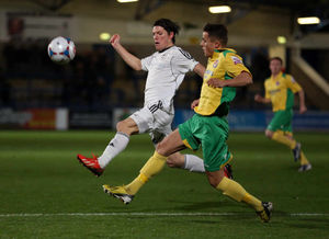 Sean Clancy of AFC Telford United and Danny Fearnehough of Vauxhall Motors