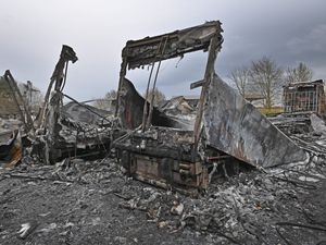 Supporting image for story: Pictured: Charred remains of vehicles seen in aftermath Oswestry fire
