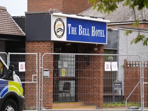 Supporting image for story: Three men arrested after officers injured at Epping hotel protest