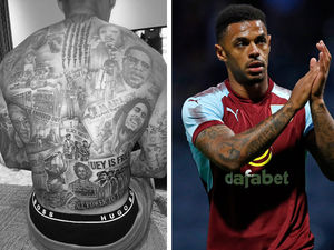 Supporting image for story: Martin Luther King, Nelson Mandela and Malcolm X: Just some of the tattoos on Andre Gray's back 