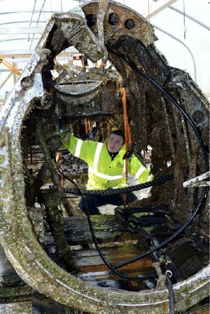 Appentice aircraft technician Matthew Treanor-Cartwright, inspects the Dornier