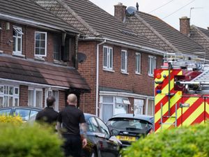 Emergency services at the scene of a house fire