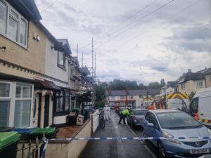 Fire investigation officers at the Dunsford Road property