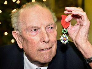 Veteran Dennis Nightingale with his D-Day medal
