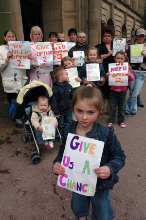 Ellie-May Hems aged five, joins the protest against Beechdale Prmiary School closure outside Walsall Town Hall
