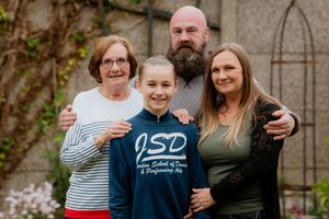 Billy Ellitts with his grandmother Valery Frost, his father Craig Spencer and mother Anita Babb
