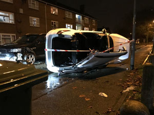 Supporting image for story: Two adults and two children taken to hospital after car flips in Willenhall crash