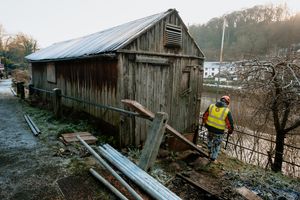 Builders are working to stabilise and preserve the coracle shed near the Iron Bridge