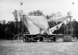 A tent or marquee at Shrewsbury Flower Show damaged by a gale or storm. Date is said to be 1934. A Shrewsbury Chronicle report of the show in August 1934 does not mention any such damage, but does mention in passing that there had been stormy weather the previous weekend, so perhaps this happened then, assuming 1934 date is correct. Picture emailed in by David Hughes of Shrewsbury. david.lorraine@talktalk.net 01743 236753 and was one of two showing the damage, about which he said: 'They were taken in 1934 at the time of the Flower Show. There was obviously a severe gale and one picture shows the stage that has been badly damaged. On the rear is written that the canopy had been torn and supporting poles snapped. The other shows a large tent that has been demolished and on the rear is written ‘’Piggots big Acre Tent ripped to ribbons and the poles snapped in places’’..." He added: 'I’m afraid I cannot tell you much more about the pictures. They were among my father (Stanley Hughes) effects when he died and I kept them for sentimental reasons. My father was one of a group of men working on the preparation of the Flower Show and I think they were employed by a firm then called Shrewsbury Building Contractors. I can only assume the photos were taken by one of the other workers. I was born in Shrewsbury and have lived most of my life here. I am 77 years old now and my sources for information have all passed on...' Library code: Shrewsbury nostalgia 2016.