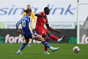 Jason Sraha of Shrewsbury Town and Thelo Aasgaard of Wigan Athletic (AMA)