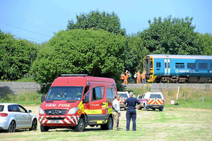 Emergency services at the scene of a train crash in Mid Wales