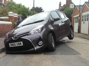 Supporting image for story: Shock for driver as sinkholes open up in Shrewsbury street - with pictures