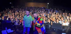 Radio DJ Paul Shuttleworth with Ben Corfield on stage at Oakengates Theatre