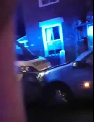 The ambulance and car in a video shot by Bill Bishop