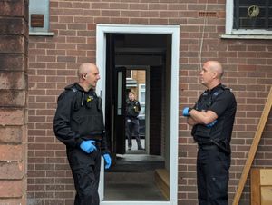 Officers outside the home in Newport