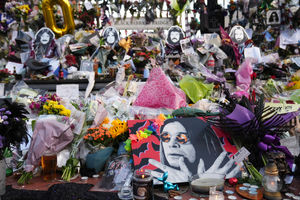 The tribures includes flowers, ballons, messages and memorabilia