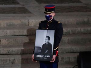 Supporting image for story: Verdicts expected for eight people on trial over beheading of teacher in France