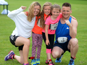 Supporting image for story: Runners face blustery weather for Cobra Classic - in photos