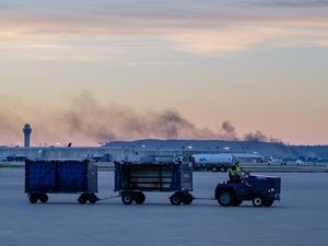 Supporting image for story: Cargo plane’s left wing caught fire before fatal Kentucky crash