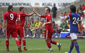 In pre-season action for Liverpool alongside Charlie Adam and Andy Carroll