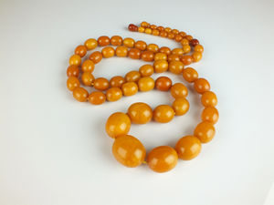 An amber bead necklace discovered at valuation day sold for £1,950.