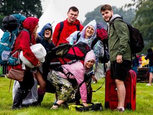 Supporting image for story: V Festival gates open: See PICTURES and VIDEO as thousands arrive at a damp Weston Park
