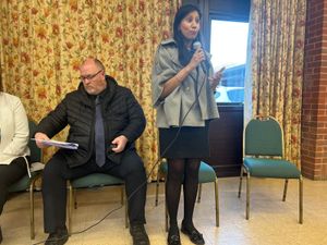Sonia Kumar MP addresses the meeting while Councillor Shaun Keasey consults his notes