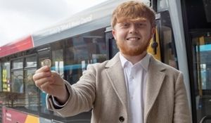 Councillor Ollie Vickers with a £2 coin for his bus fare. Picture: Telford & Wrekin Council