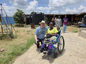 Neil Hope with Jill Baraka, who he first met when she was a few days old, at Saidia Children's Home in Gilgil.