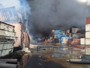 Containers burn after the massive explosion