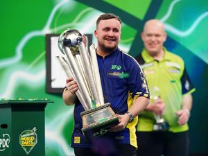 Supporting image for story: Luke Littler hammers Michael van Gerwen to win first World Championship