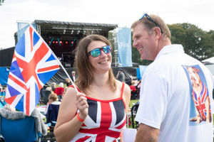 Two spectators enjoying the sunshine