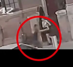 Meade could be seen firing at an unknown assailaint on a busy street near Birmingham's Grand Central